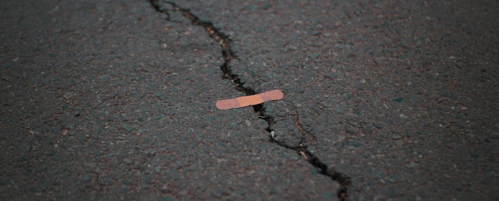 Road crack detection with stacked neural networks